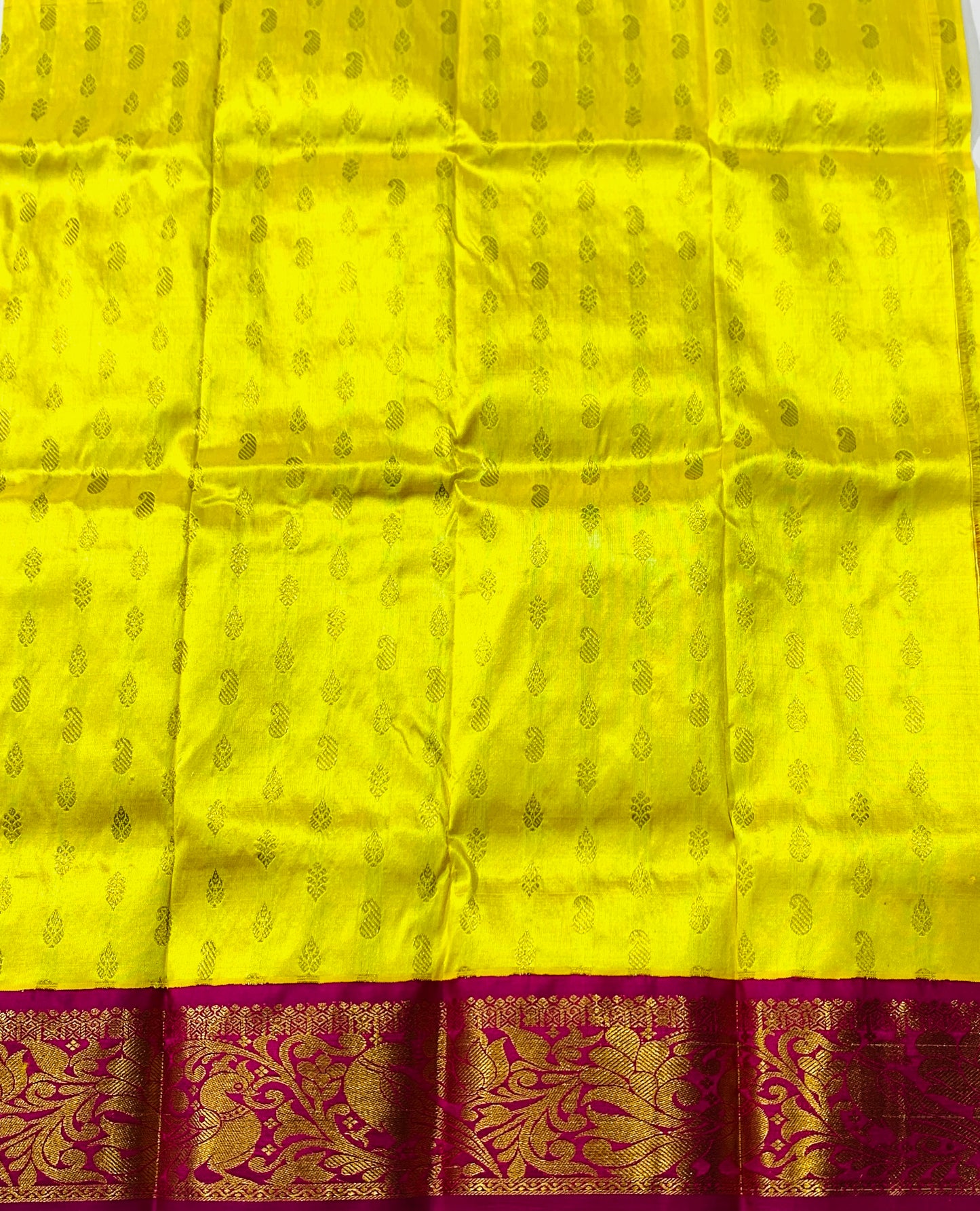 Lemon Yellow shade Pure kanchipuram Kids Pattu Pavadai with contrast border for newborn to 2 Years