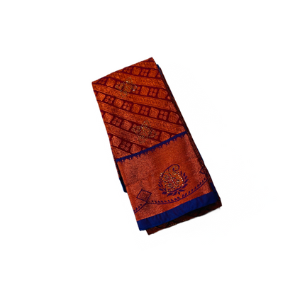 Maroon Shade Soft kanchi pattu with Copper and Blue Border with Mango design.