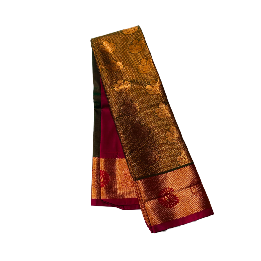 Olive Green shade Soft kanchi pattu with Copper and Pink Border.