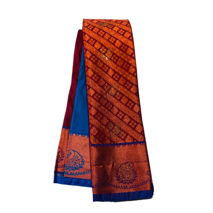 Maroon Shade Soft kanchi pattu with Copper and Blue Border with Mango design.