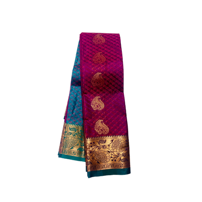 Magenta shade Soft kanchi pattu with Golden zari with Green Border.