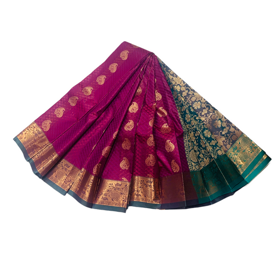 Magenta shade Soft kanchi pattu with Golden zari with Green Border.