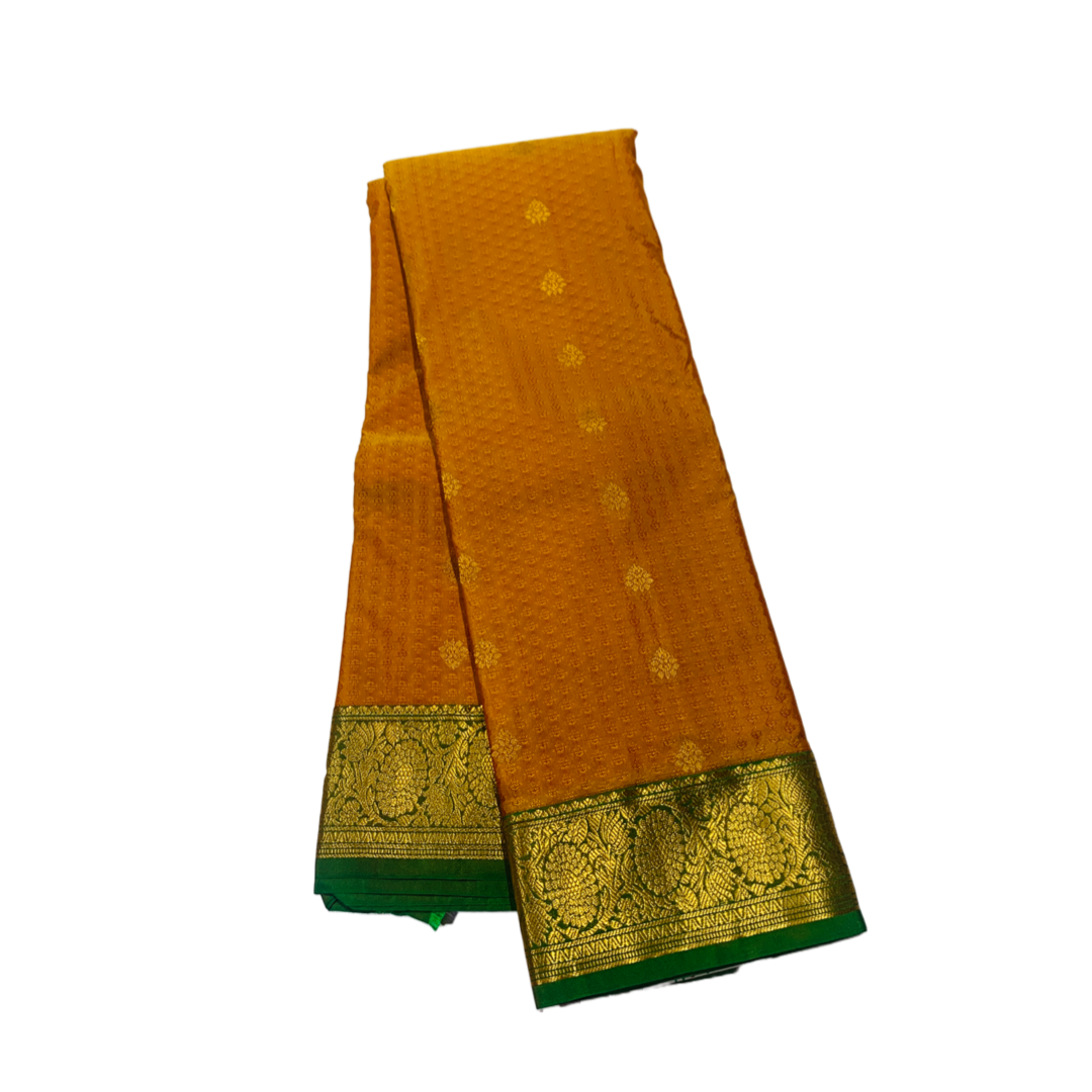 Mustard shade Semi Silk Saree with Green Border with Floral Design