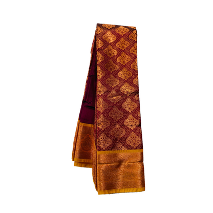 Maroon shade Soft kanchi pattu with Copper and  Golden Yellow Border.