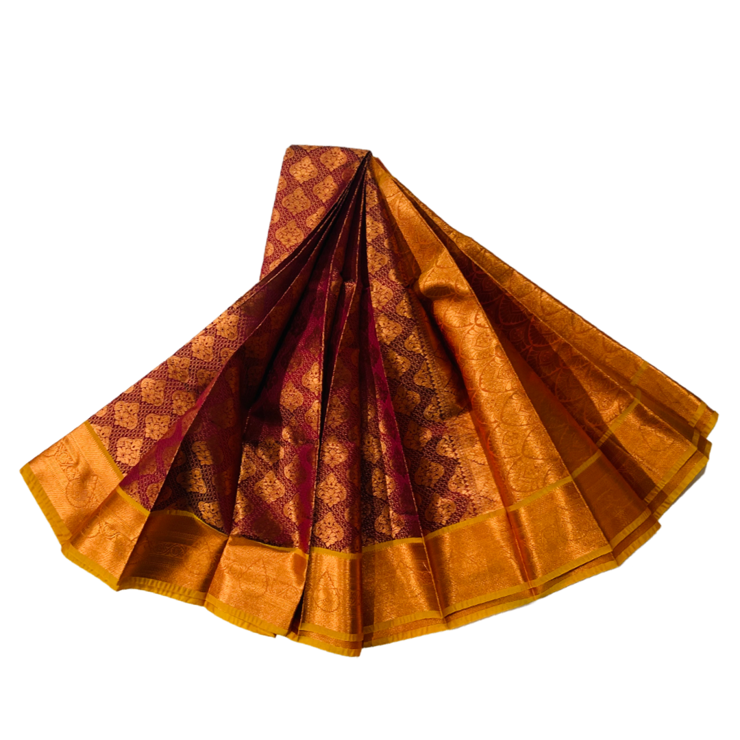 Maroon shade Soft kanchi pattu with Copper and  Golden Yellow Border.