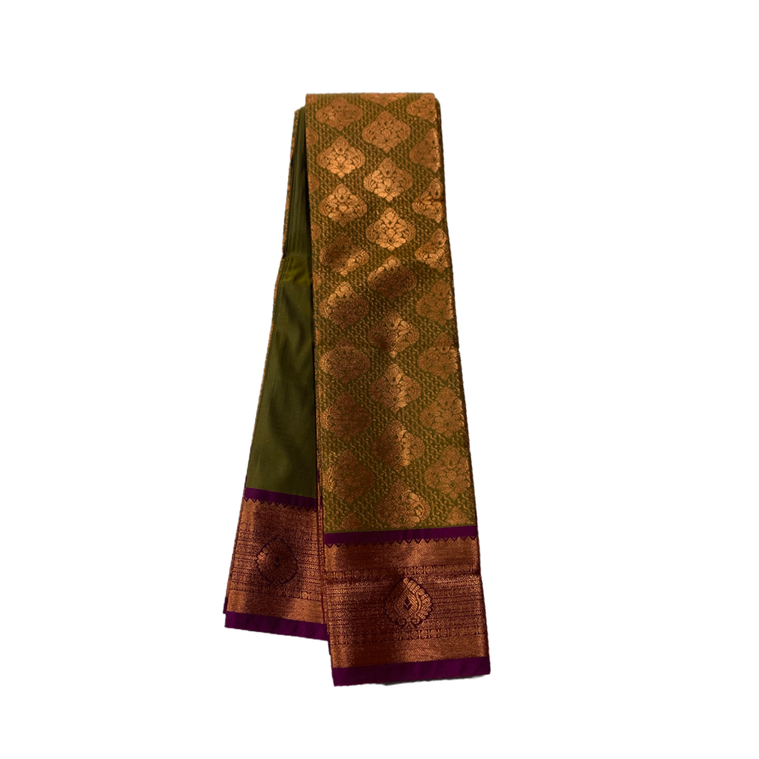 Green shade Soft kanchi pattu with Copper and Brown Border.