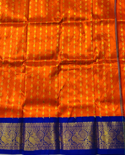 Orange shade Pure kanchipuram Kids Pattu Pavadai with contrast for newborn to 2 Years