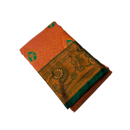 Orange shade Soft kanchi pattu with Green Border with flower design.