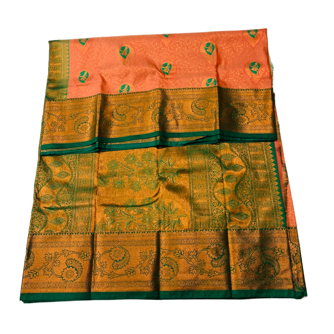 Orange shade Soft kanchi pattu with Green Border with flower design.