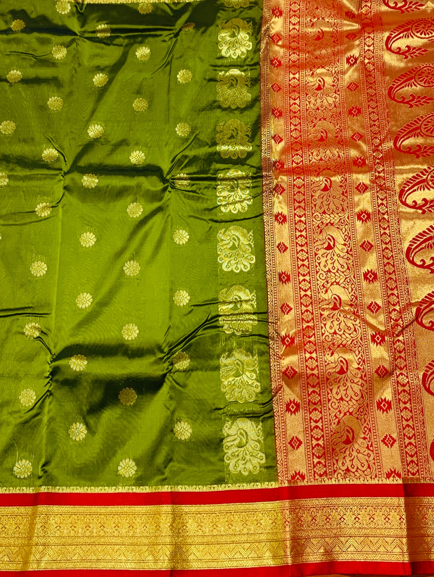 Olive Green shade saree with Golden and Red Border