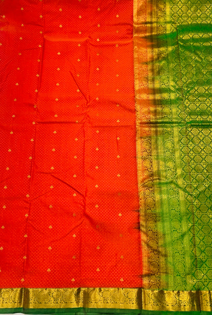 Orange shade Semi Silk Saree with Green Border with Mango and Flower Design