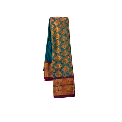 Peacock Blue shade Soft kanchi pattu with Copper and Purple Border.