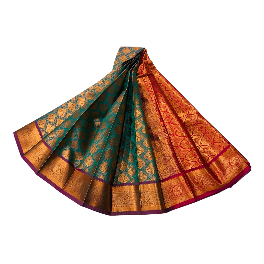 Peacock Blue shade Soft kanchi pattu with Copper and Purple Border.