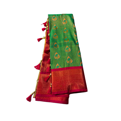 Peacock Green shade Soft kanchi pattu with Pink Border with Unstitched blouse in Aari work.