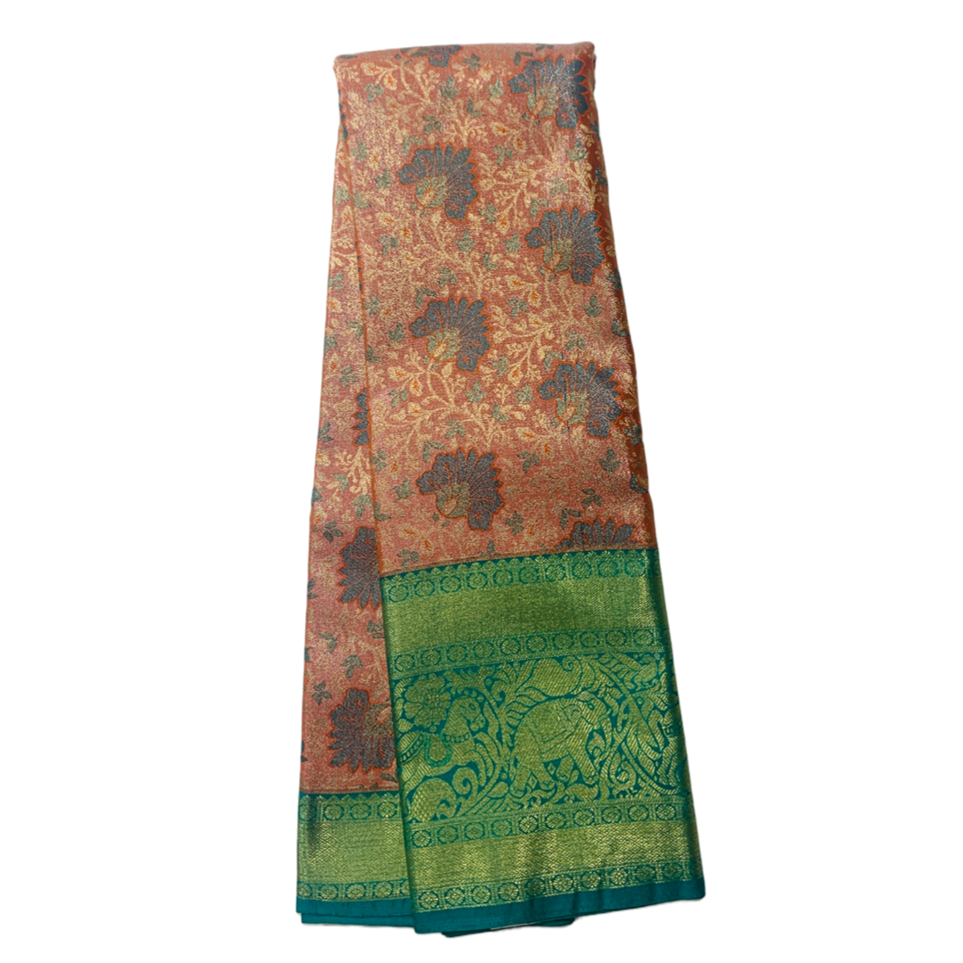 Peach shade Soft kanchi pattu with Green Border.