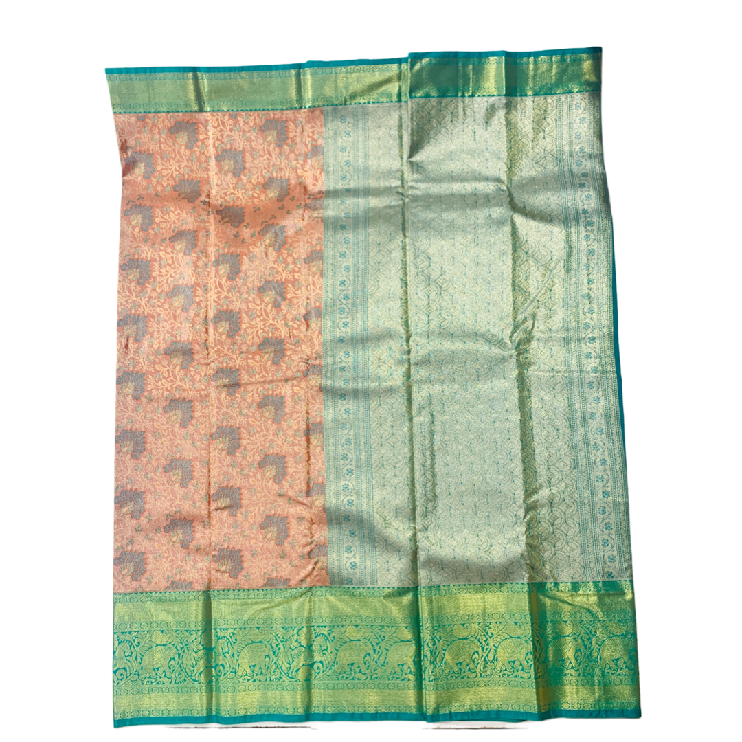 Peach shade Soft kanchi pattu with Green Border.