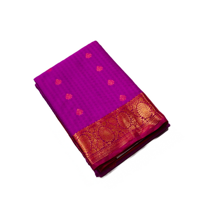 Purple shade Semi Silk Saree with flower design border.