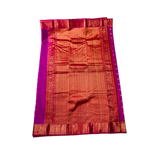 Purple shade Semi Silk Saree with flower design border.
