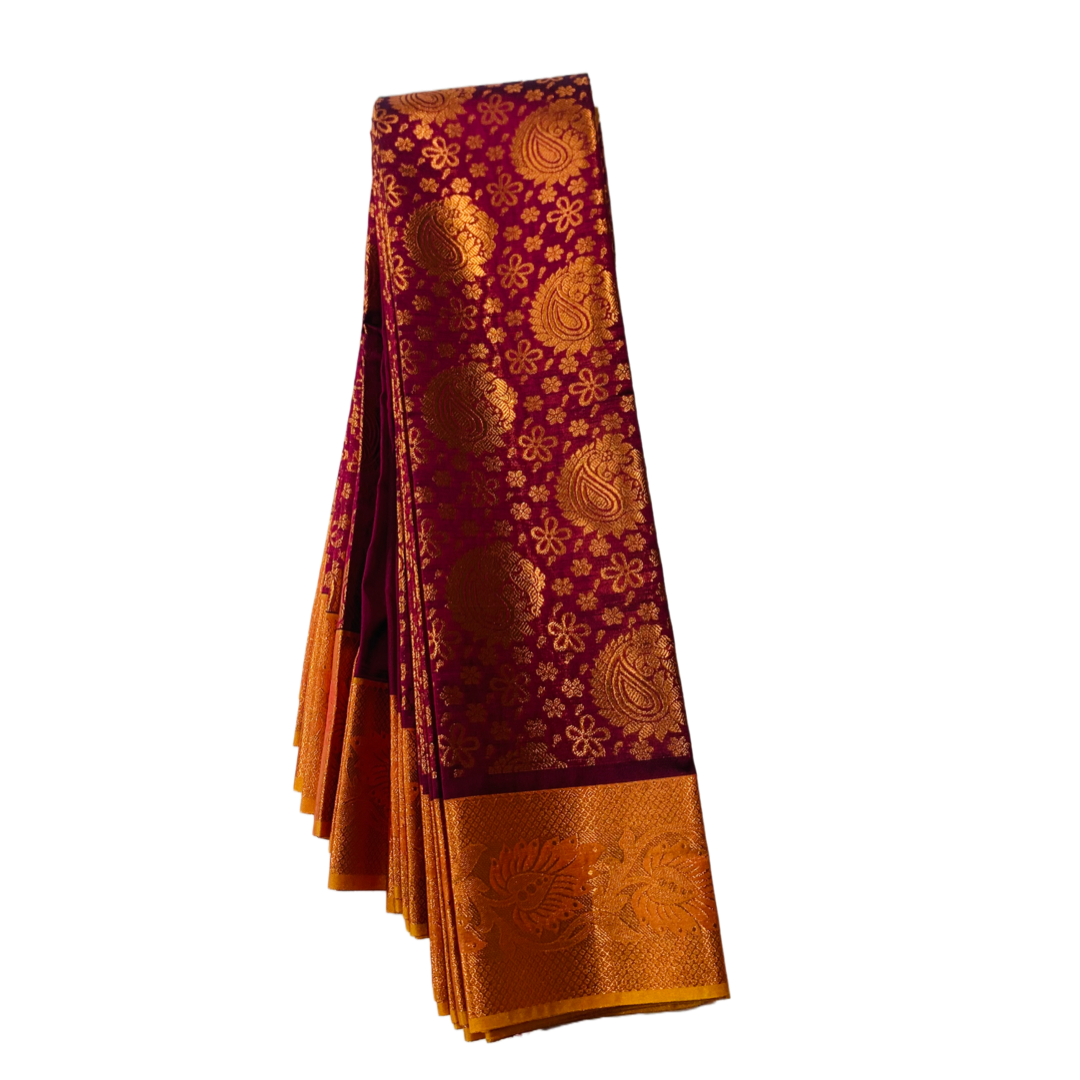 Purple shade Soft kanchi pattu with Mango design.