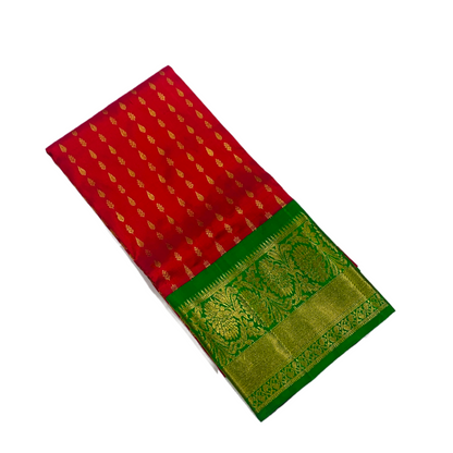 Red shade Pure Kanchipuram Kids Pattu Pavadai with contrast border for age 5 to 10