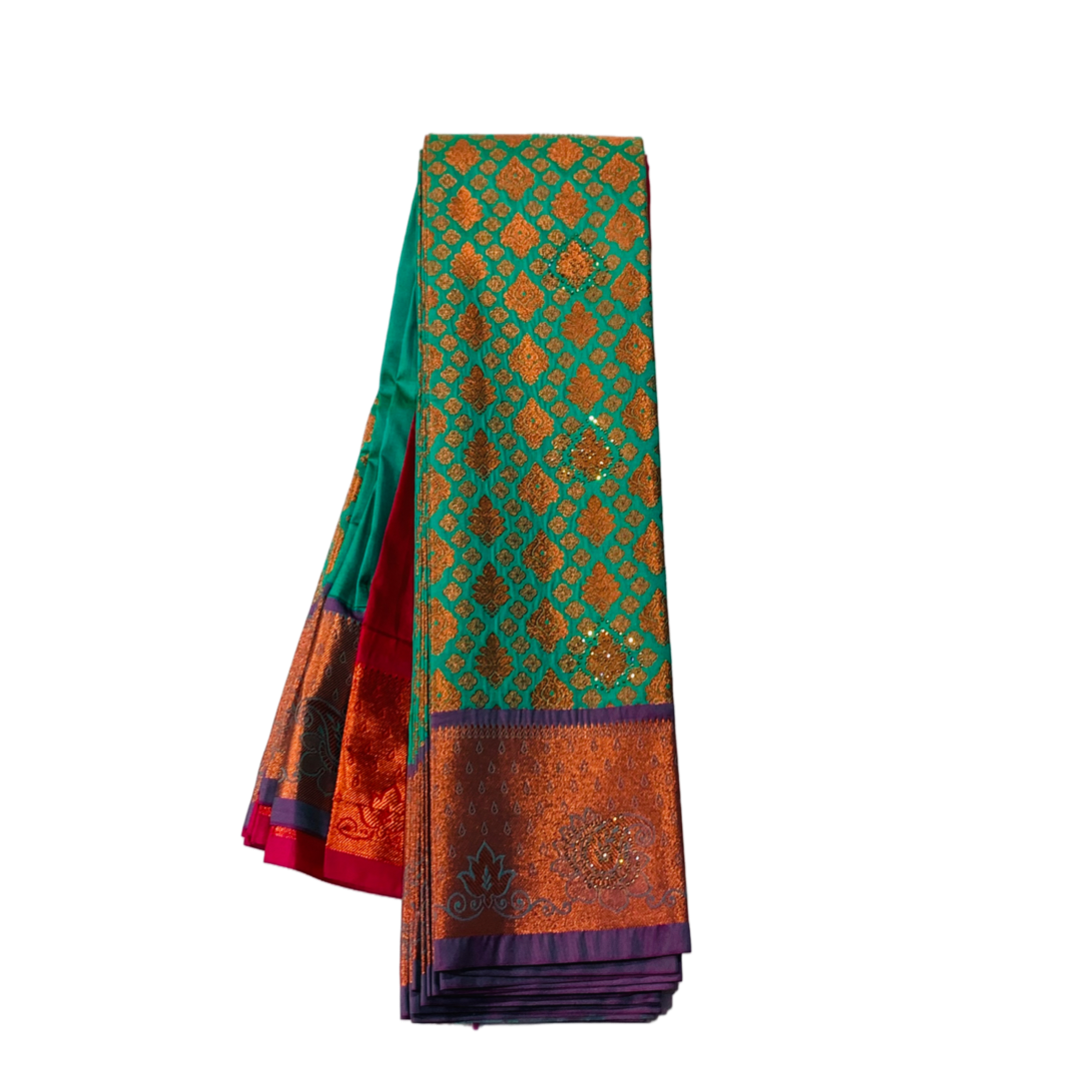 Ramar Green Soft kanchi pattu with Copper and Purple Border.