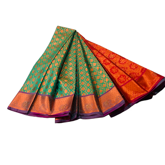 Ramar Green Soft kanchi pattu with Copper and Purple Border.