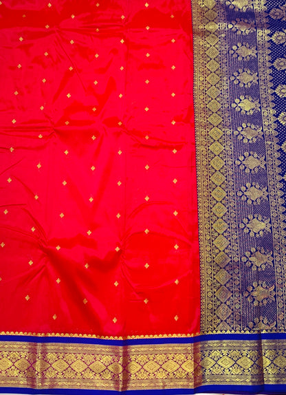 Red shade saree with Sliver and Blue Border