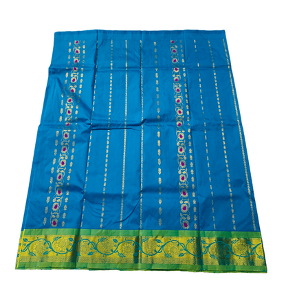 Sky Blue shade Semi Silk Kids Pattu Pavadai with contrast border for age 5 to 10