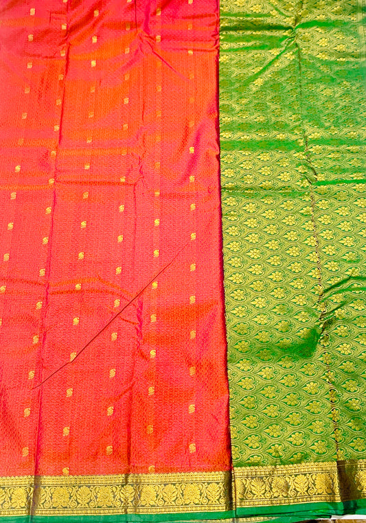 Tomato Red shade Semi Silk Saree with Green Border with Flower Design