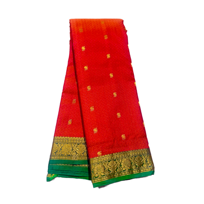 Tomato Red shade Semi Silk Saree with Green Border with Flower Design