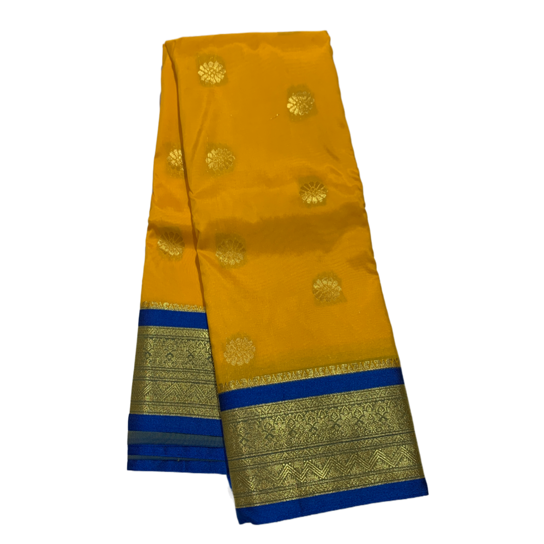 Yellow shade saree with Golden and Blue Border