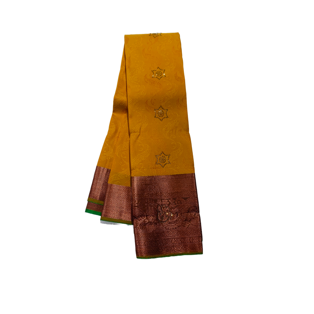 Yellow shade Soft kanchi pattu with Copper zari Border